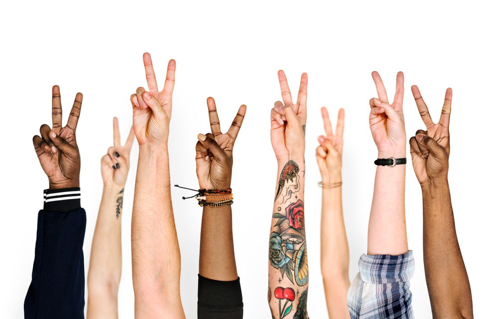 Making the peace sign with your fingers