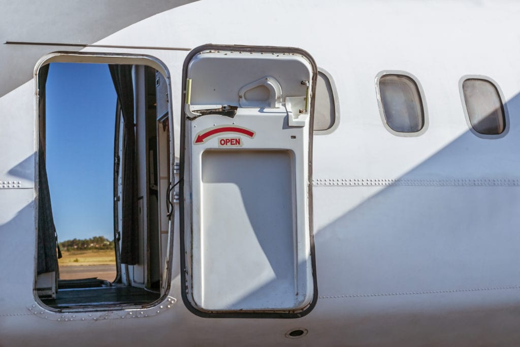 open a plane door in the middle of a flight