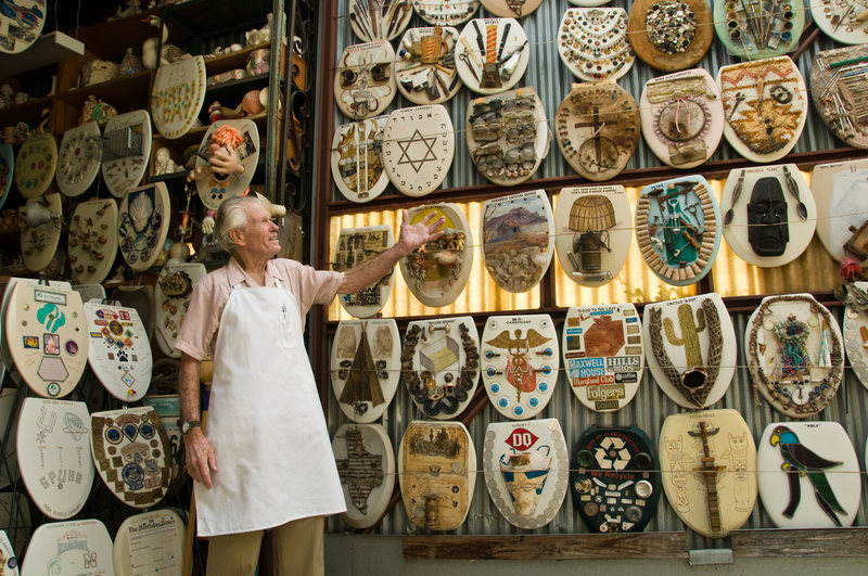 Barney Smith shows off his prized toilet seat creations Barney Smith's Toilet Seat Art Museum, Alamo Heights, Texas.