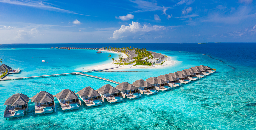 Maldives paradise scenery. Tropical aerial landscape, seascape, with long jetty