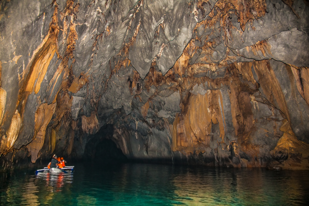 Boats at cave of Puerto Princesa subterranean underground river. Palawan, Philippines. 