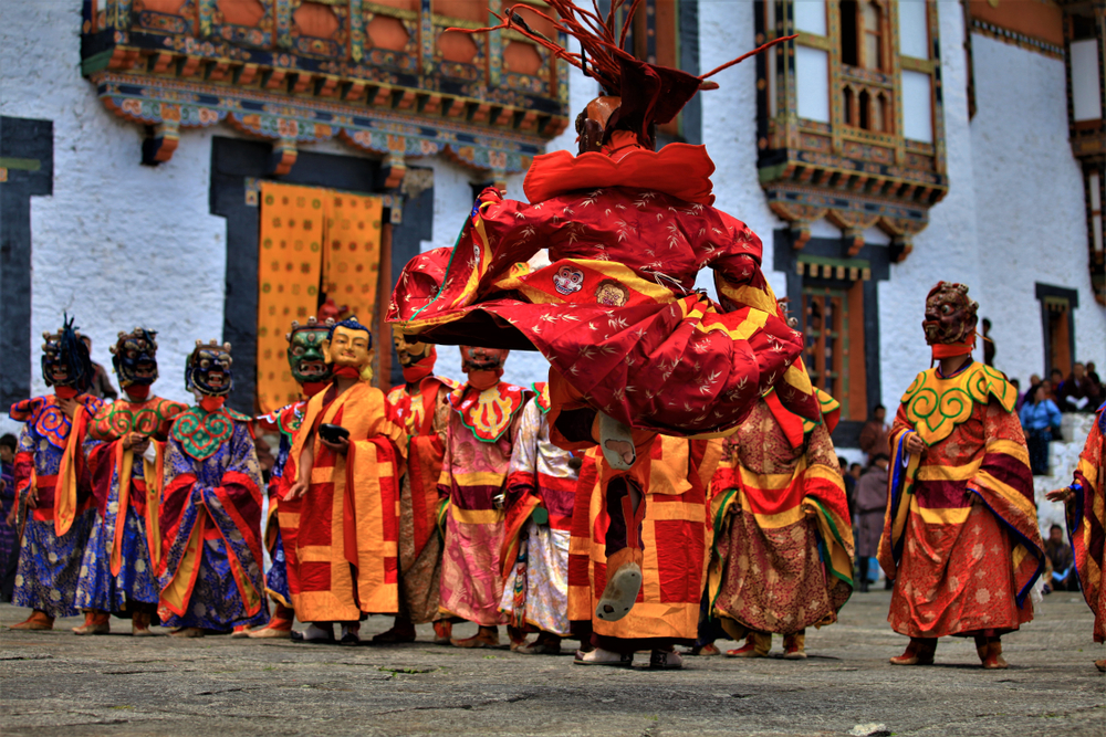 Bhutan dance, Close up Traditional dance and colors in Mongar, Bhutan ,masked dancers at a Buddhist religious ceremony ,happy holiday
