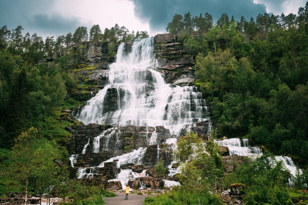 Voss, Hordaland, Norway. Waterfall Tvindefossen In Spring. Largest And Highest Waterfall Of Norway. 