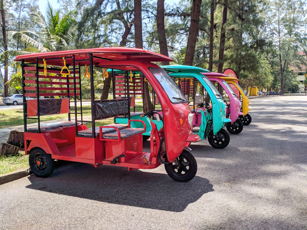 Malaysia, Kuala Terengganu 15 Jun 2020 : Three-wheel automatic electric motors utilize batteries and four-wheel scooters in Kuala Terengganu