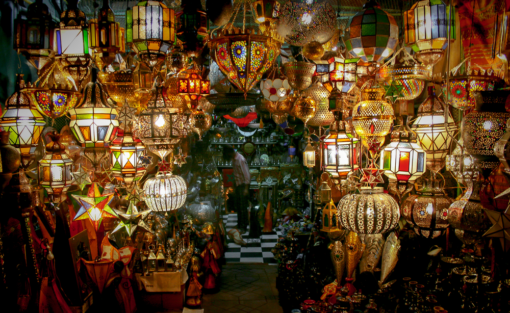 Entrance to a store in Marrakech decorated with traditional lamps in various forms and colors