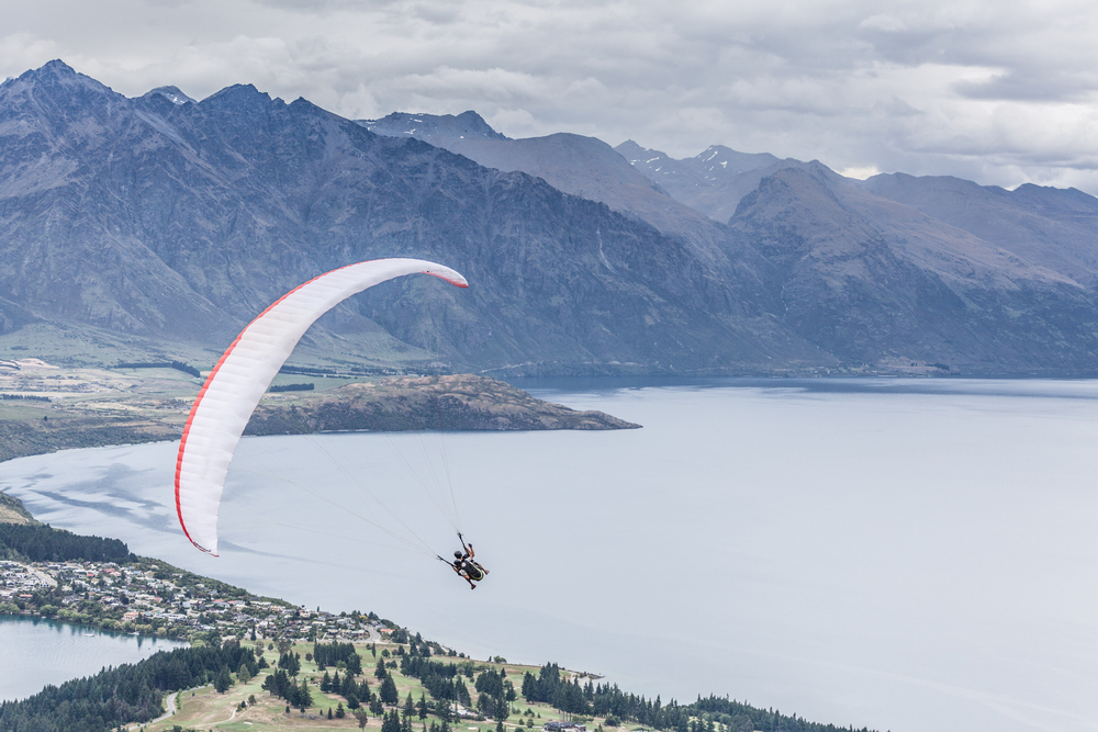 Paragliding with instructor above lake Wakatipu, Queensland, Otago, New Zealand