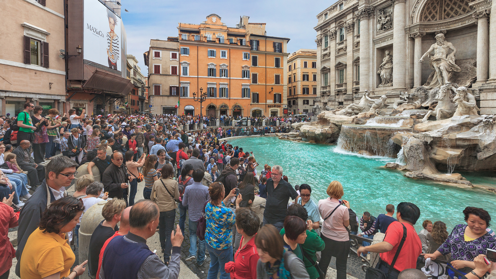 Rome, Italy - May 2, 2011: Fountain di Trevi surronded by hundreds of tourists
