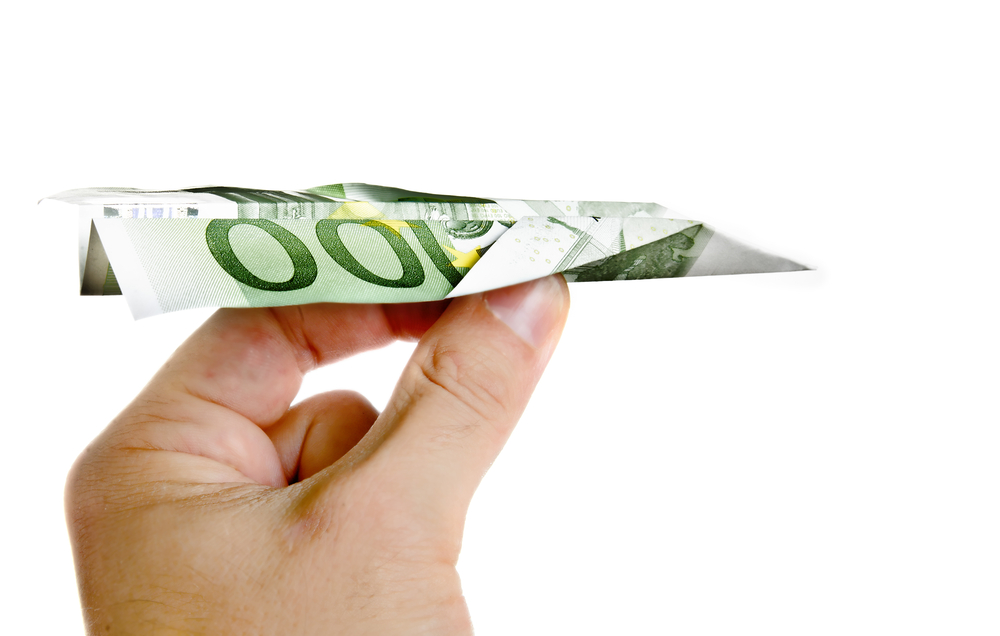 Man Hand Holding 100 Euros Banknote Paper Plane isolated on White Background