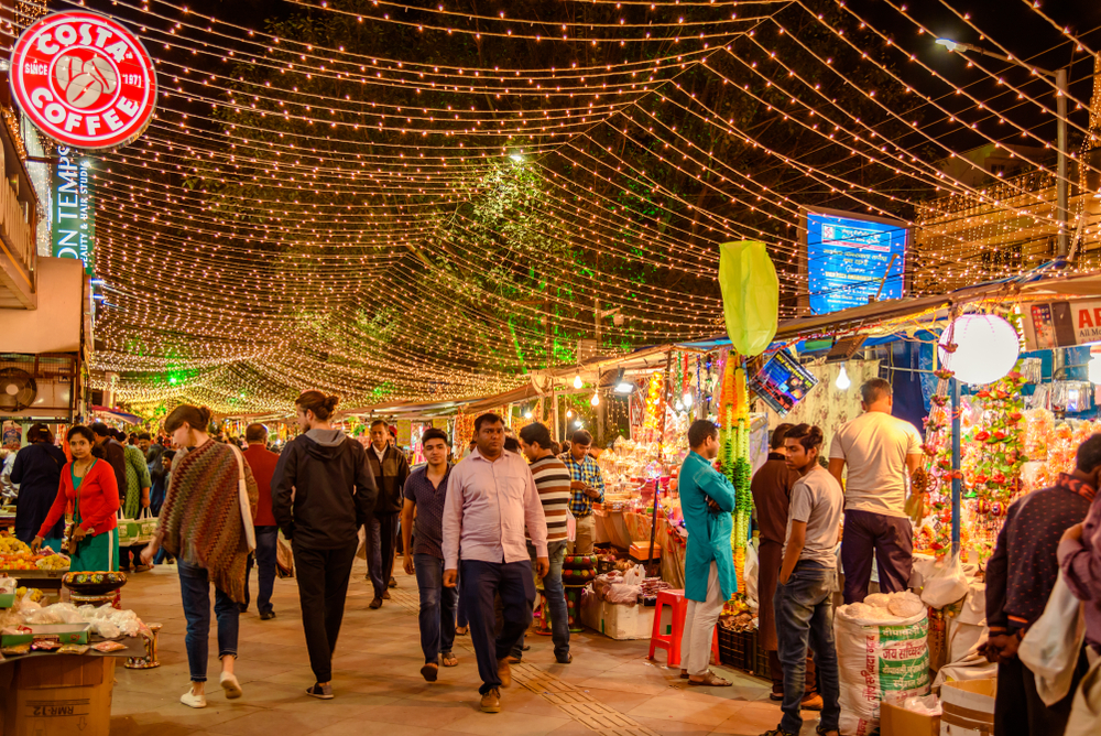 NEW DELHI, INDIA - November 2018: People doing shopping in decorated market on the occasion of Diwali Eve a Hindu Festival.