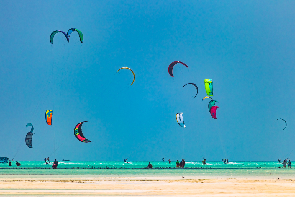 Kiteboarding near Jambiani village. Zanzibar is one of the best places for kiteboarding vacations. Warm shallow water and constant wind.