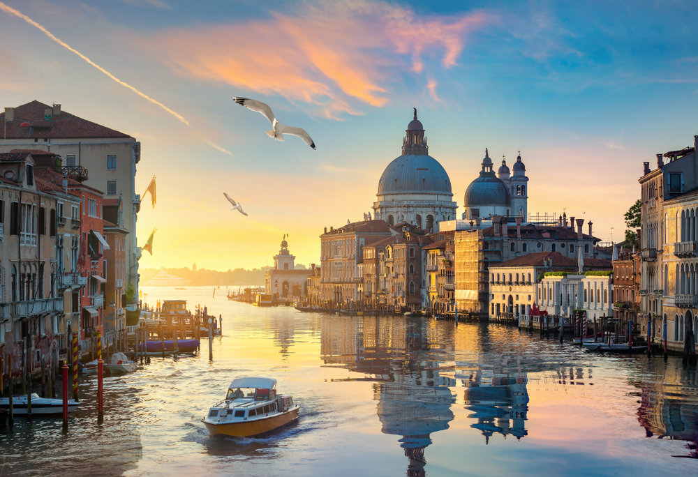 Beautiful calm sunset over Grand Canal in Venice, Italy