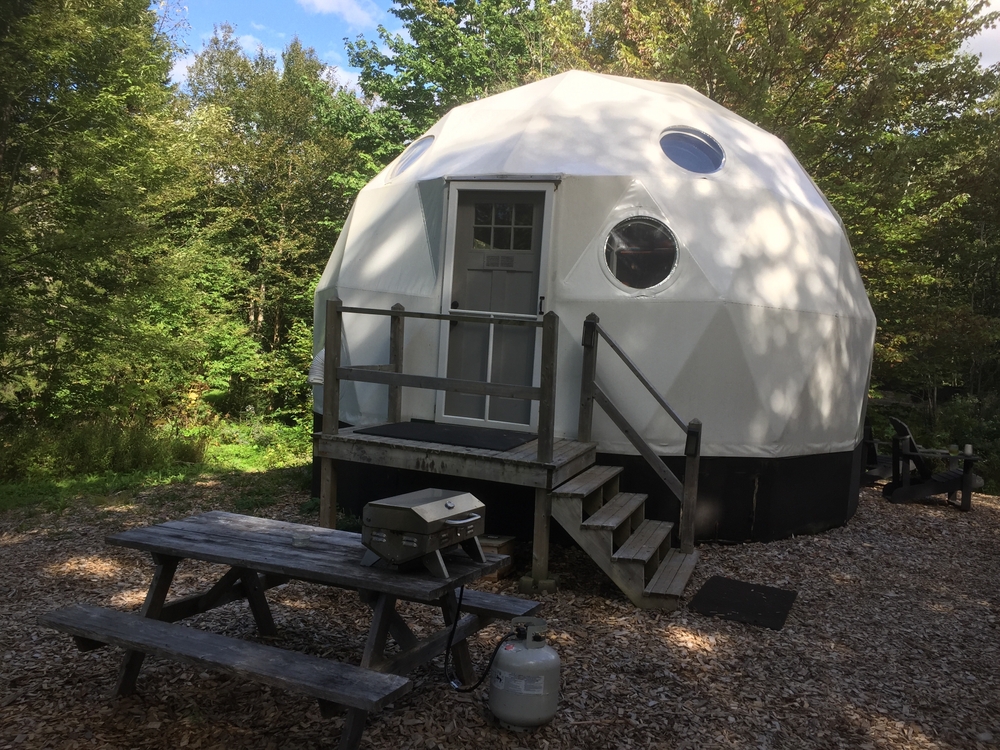 Dome off grid home in woods