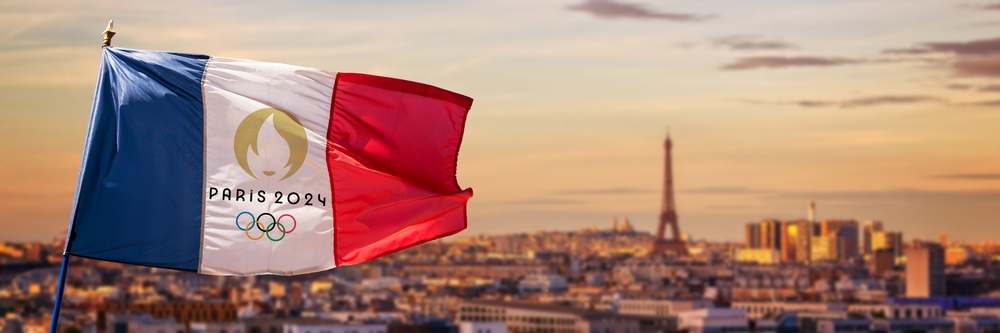 French flag with Paris 2024 summer olympic games logo, Eiffel tower on May 23, 2017 in Paris France