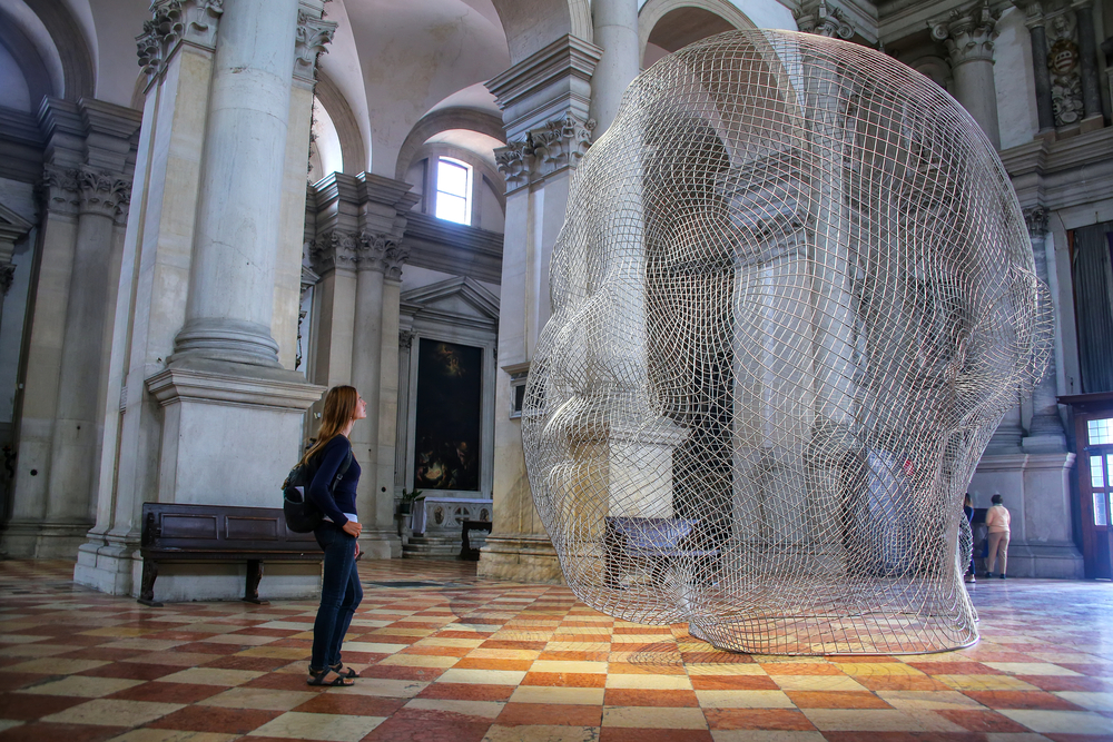 Sculptural installation by Jaume Plensa during Venice Art Biennale inside San Giorgio Maggiore church on June 22,2015 in Venice, Italy. Church was built between 1566 and 1610