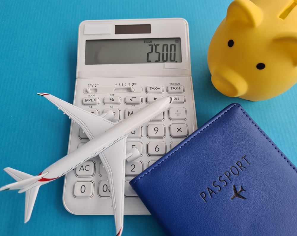 Saving travel budget and airfare closeup.