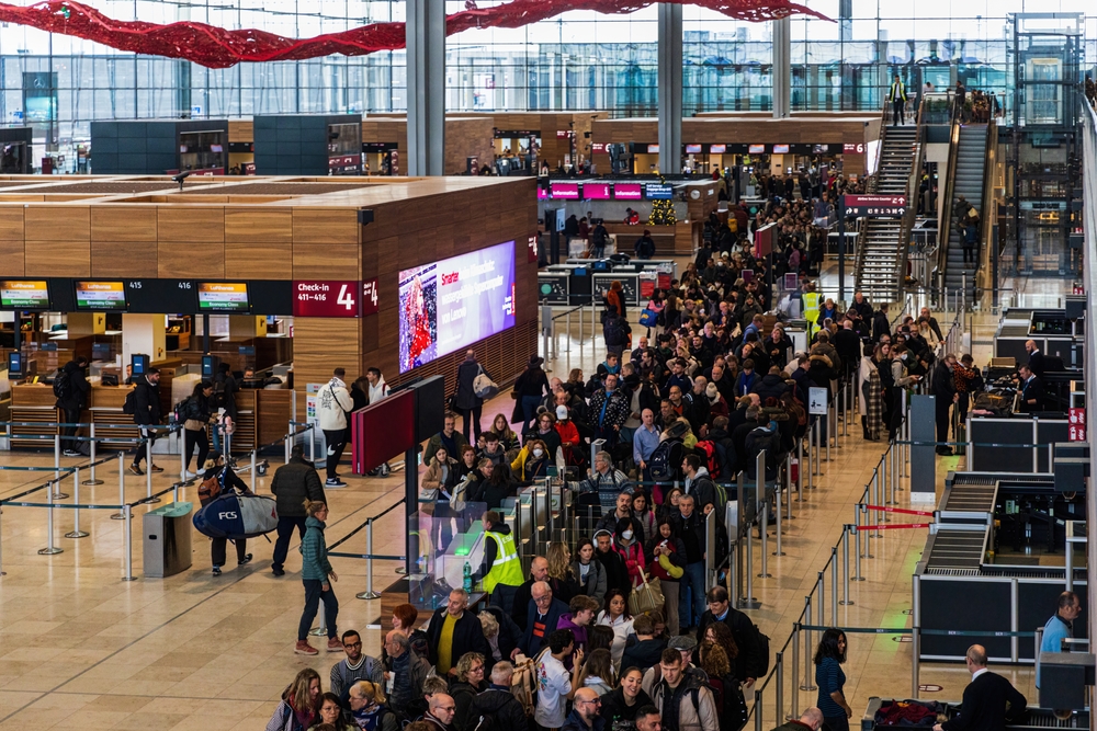 Long lines building up at the security check at Berlin Brandenburg International Airport. BER Airport still struggles with waiting times of more then half an hour.