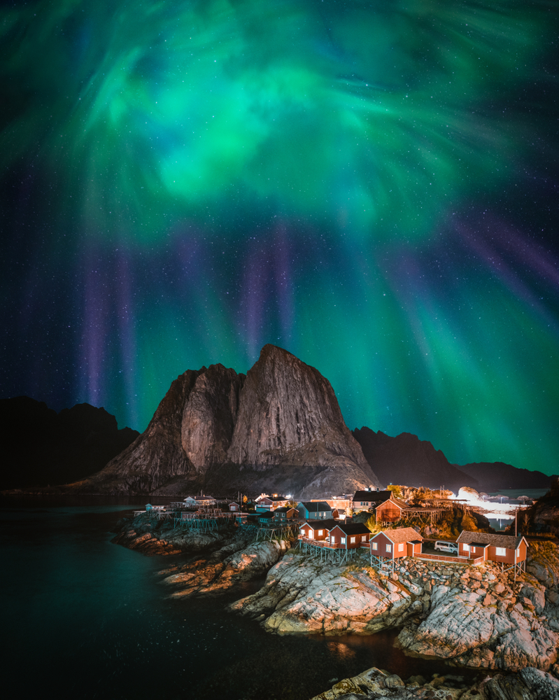 Northern Lights Aurora Borealis with classic view of the fisherman s village of Hamnoy, near Reine in Norway, Lofoten islands. 