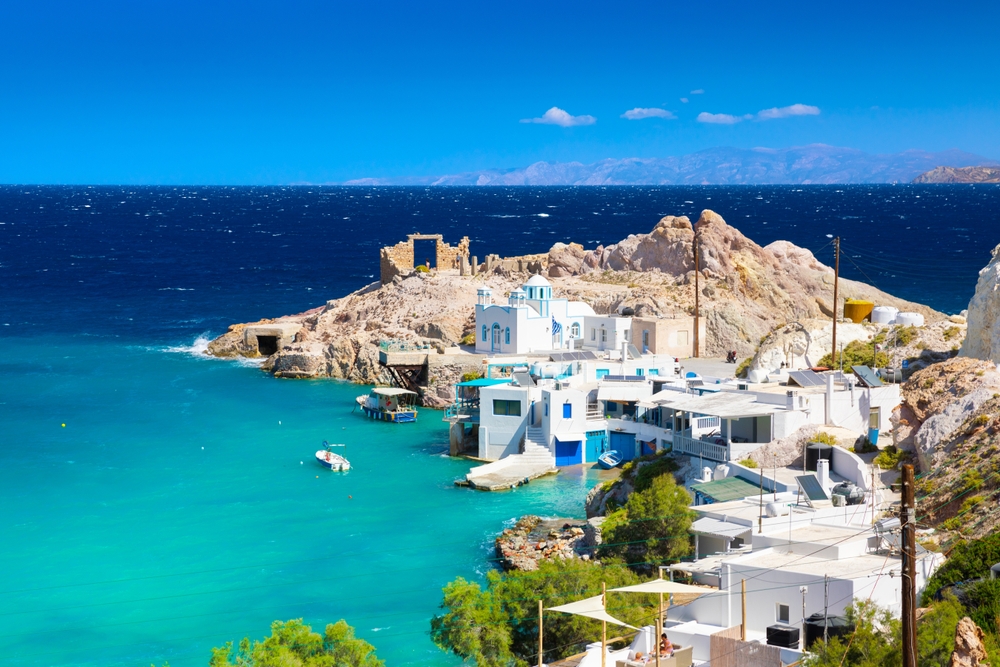 Beach and fishing village of Firapotamos on Milos island, Greece