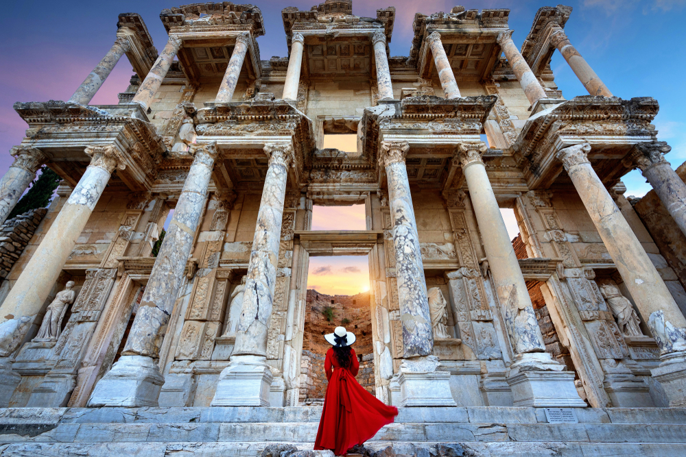 Woman standing at Ephesus ancient city in Izmir, Turkey.