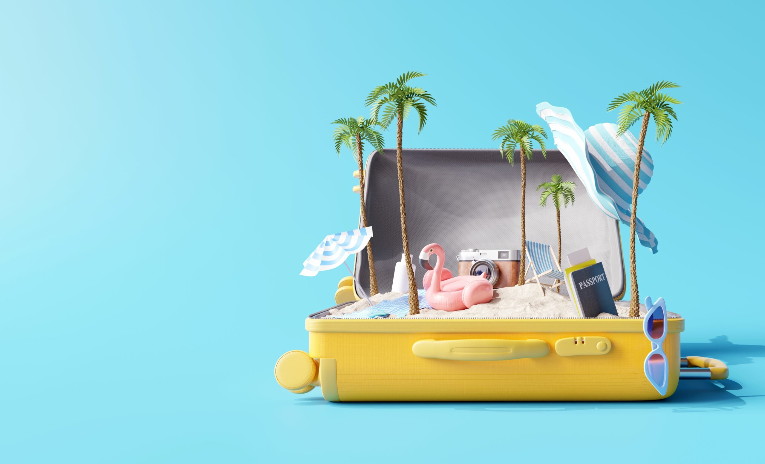 Creative summer beach composition in suitcase on blue background. 