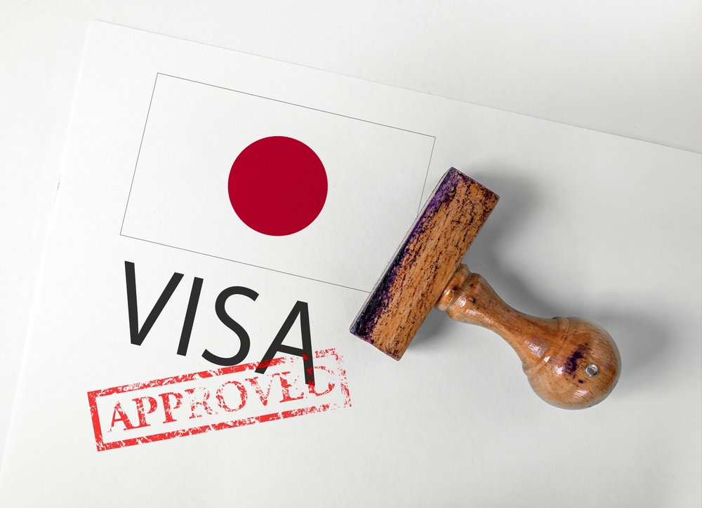Japan Visa Approved with Rubber Stamp and flag