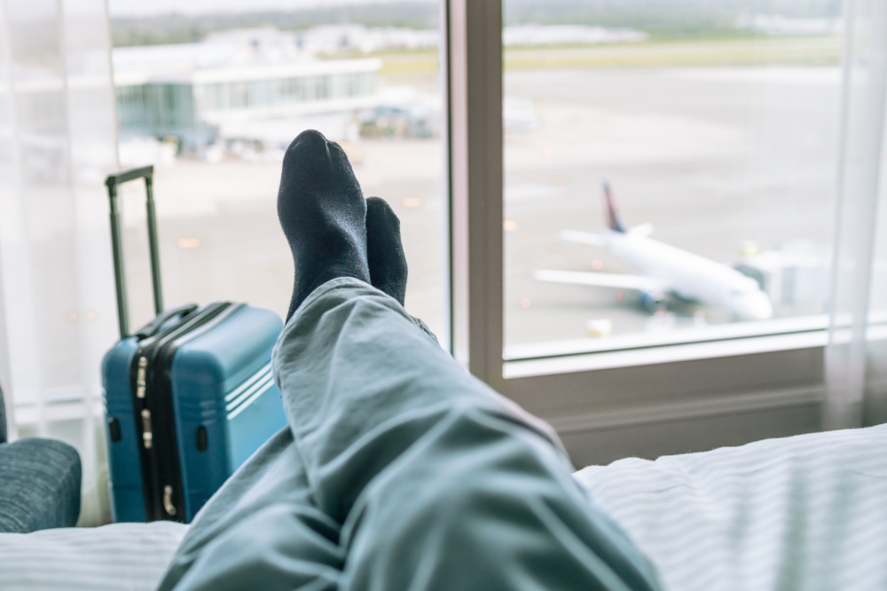 Person resting at airpot stopover